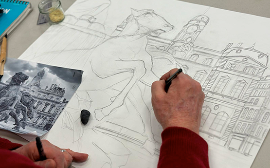 main homme avec un crayon qui dessine un croquis polyèdre seynod annecy